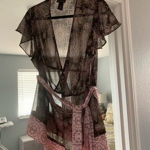 Faux wrap top with silk trim and belt